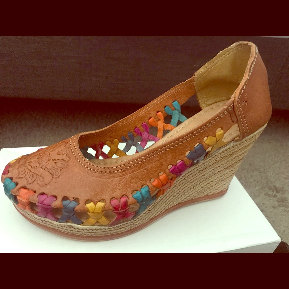 Brand new Leather wedges